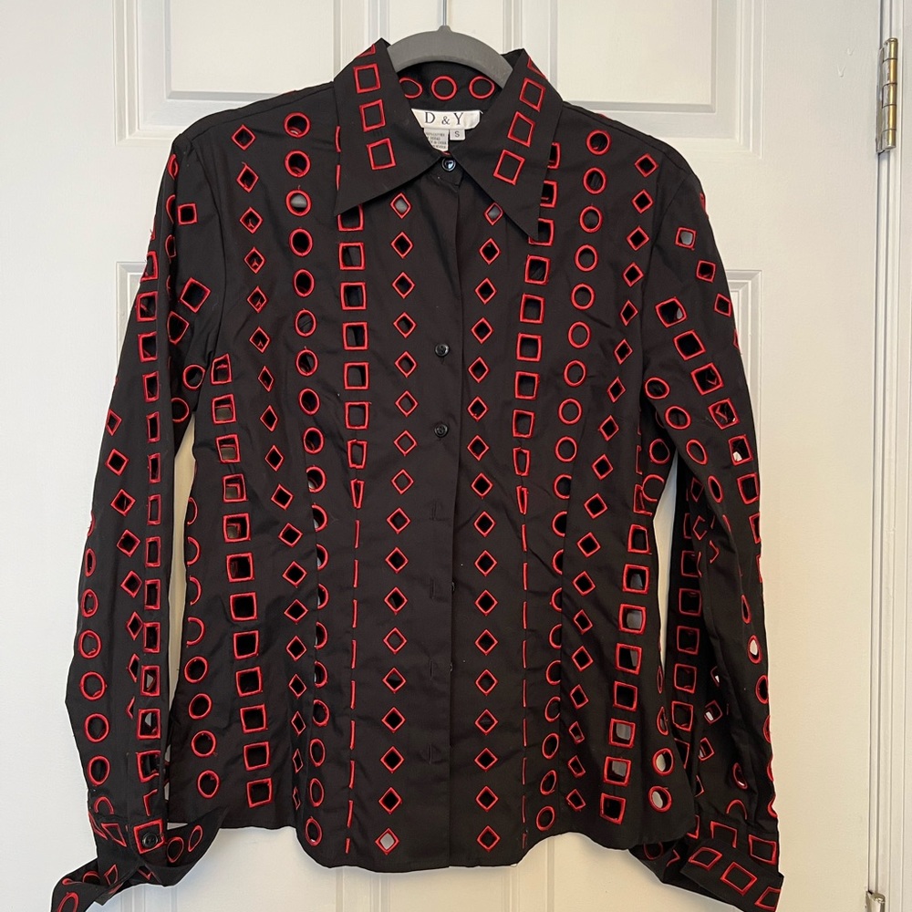 Unique blouse with cut outs, black cami underneath, fun & different